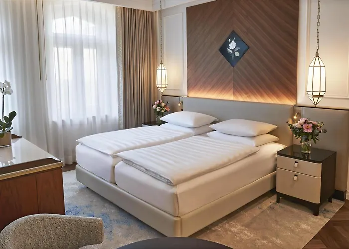 Vier Jahreszeiten Kempinski Отель