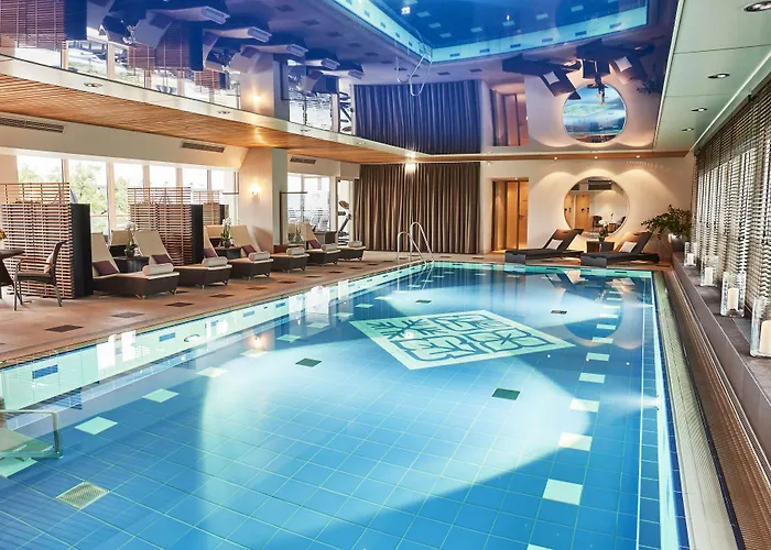 Отель Vier Jahreszeiten Kempinski
