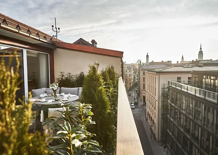Отель Vier Jahreszeiten Kempinski 5*