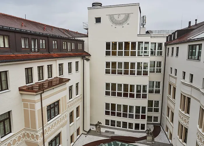 Vier Jahreszeiten Kempinski Отель